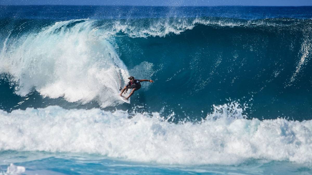 Surfer Riding Wave