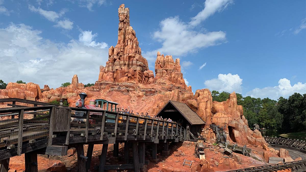 Wide shot of Big Thunder Mountain Railroad at Disney World’s Magic Kingdom in Orlando, Florida, USA