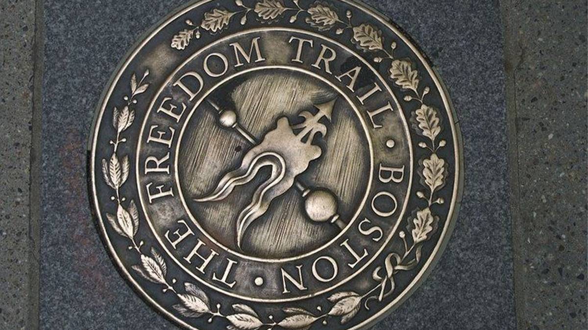 seal of the freedom trail in the sidewalk in Boston, Massachusetts, USA
