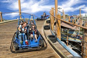families riding go carts at the track in branson missouri