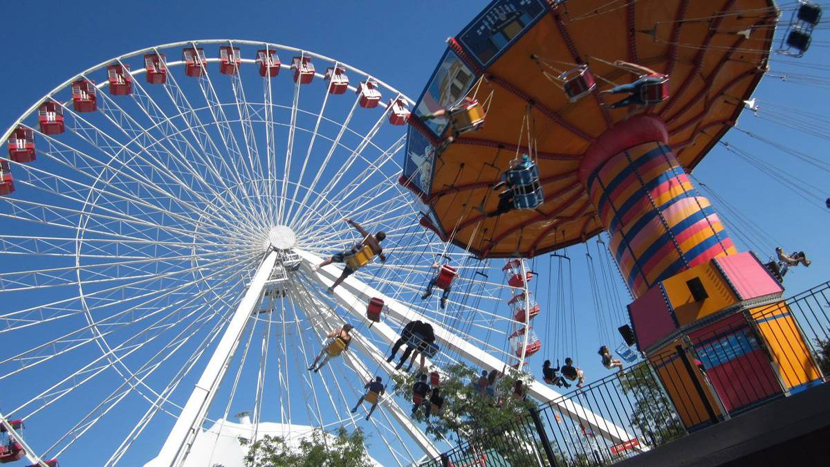 Experience thrills on the Centennial Wheel or the Pepsi Wave Swinger in Chicago, Illinois, USA