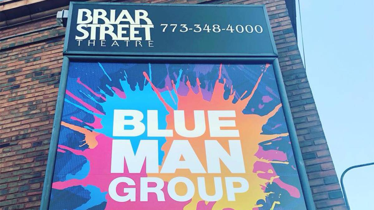 Close up of a sign for the Blue Man Group at the Briar Street Theatre in Chicago Illinois