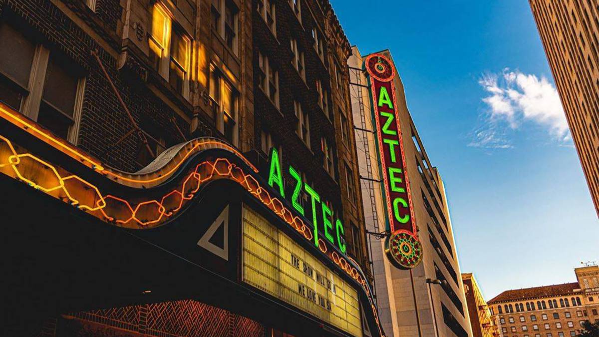 Shot looking up at the neon sign attached to the outside of the Aztec Theatre in Myrtle Beach, South Carolina