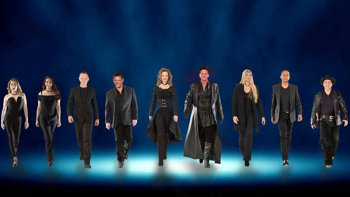 Wide shot of the performers for the Hamners' New Year's Eve Fiesta Party with a dark blue background in Branson, Missouri, USA