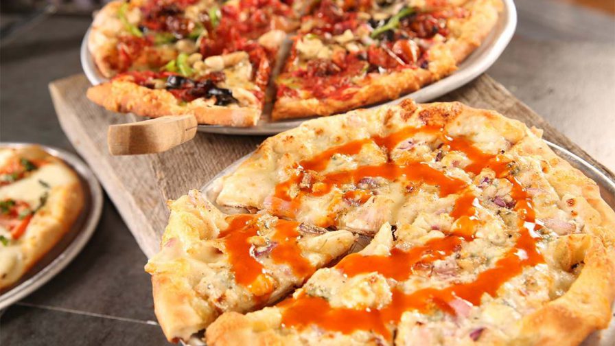 Close up photo of different pizzas from Smoky Mountain Brewery in Gatlinburg, Tennessee, USA