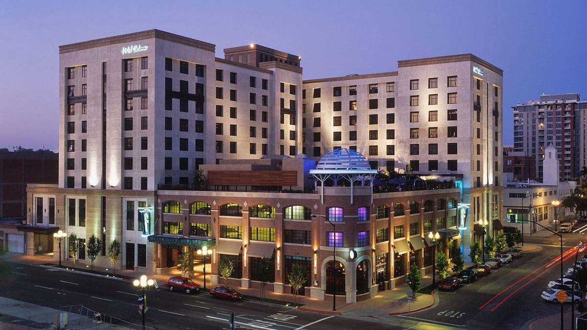 exterior of Kimpton Solamar Hotel at night with view of street in San Diego, California, USA