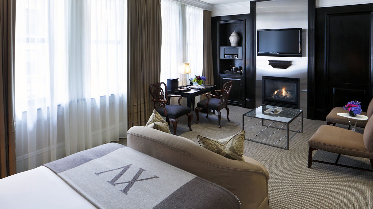 hotel room with beige and white curtians,