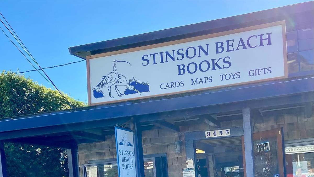 Close up of the sign for Stinson Beach Books that hangs above their door near San Francisco, California, USA